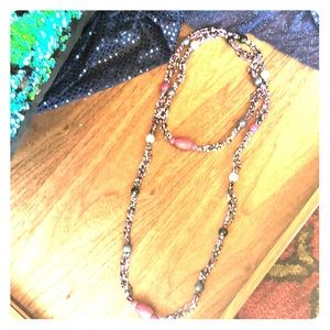Long multi color multi strand bead necklace